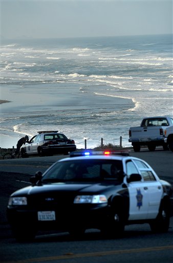 
 With a tsunami warning in effect for Northern California, police patrol along San Francisco's Great Highway on Friday, March 11, 2011. Tsunami warnings were issued after an 8.9-magnitude earthquake struck Japan. (AP Photo/Noah Berger)
 