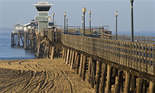 
 The shore and pier at Seal Beach, Calif. are closed to the public as officials wait for a tsunami warning to pass on Friday, March 11, 2011, after a major earthquake and tsunami struck Japan. (AP Photo/Orange County Register, Bruce Chambers)
 
