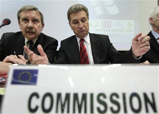 
 European Commissioner for Energy Guenther Oettinger, center, and the Director of the European Commission Energy Directorate Nuclear Energy Department Peter Faross, attend a hastily convened meeting of energy ministers, nuclear regulators and industry officials in Brussels, Tuesday, March 15, 2011. The European Union on Tuesday considers stress tests to see how its 143 nuclear plants would react in emergencies and says it might have to reassess the construction procedures in the wake of Japan's crisis. (AP Photo/Yves Logghe)
 