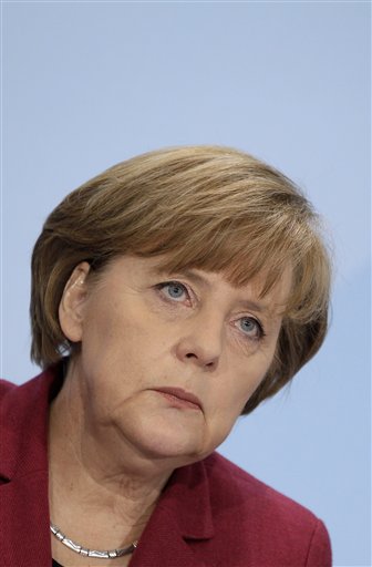 
 German Chancellor Angela Merkel attends a news conference in Berlin, Germany, Tuesday, March 15, 2011. Germany will take seven of its 17 nuclear reactors offline for three months while the country reconsiders plans to extend the life of its atomic power plants in the wake of events in Japan, Chancellor Angela Merkel said Tuesday. (AP Photo/Michael Sohn)
 