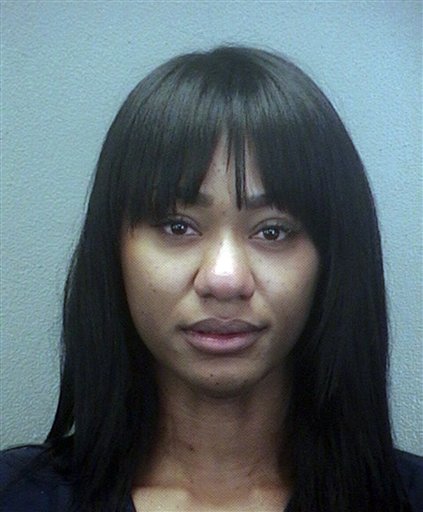 
 This booking photo released Saturday April 23, 2011, by the Broward County Sherriff's Office, shows Michi Nogami-Marshall. Brandon Marshall's wife is accused of stabbing the Miami Dolphins wide receiver and has been arrested on a domestic violence charge, according to a police report. The report, which was posted on The South Florida Sun Sentinel's website, says Nogami-Marshall stabbed her husband with a kitchen knife Friday, April 22, 2011. (AP Photo/Broward County Sherriff's Office)
 