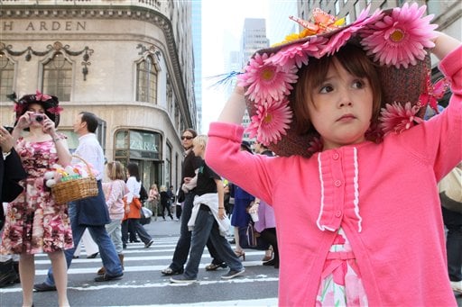 
 **CORRECTS SPELLING** Julia Scotti, 4, of Fairlawn, N.J., right, adjusts her hat as she and her mother Regina Scotti, left, take part in the Easter Parade along New York's Fifth Avenue Sunday April 24, 2011. (AP Photo/Tina Fineberg)
 