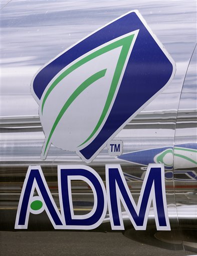 
 In this photo taken July, 2009, the ADM logo is seen on a tanker truck which carries mostly corn syrup at the Archer Daniels Midland Company plant in Decatur, Ill. The agribusiness conglomerate Archer Daniels Midland Co. says it will cut 1,000 jobs company wide. (AP Photo/Seth Perlman)
 