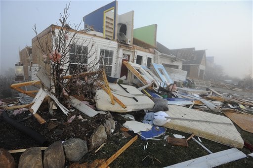 
 A house is destroyed by tornado damage in Dexter, Mich. Friday, March 16, 2012. Initial estimates indicate the tornado that hit Dexter, northwest of Ann Arbor, Thursday evening was packing winds of around 135 mph, National Weather Service meteorologist Steven Freitag said Friday. (AP Photo/Detroit News, Daniel Mears) DETROIT FREE PRESS OUT; HUFFINGTON POST OUT MAGS OUT MANDATORY CREDIT
 