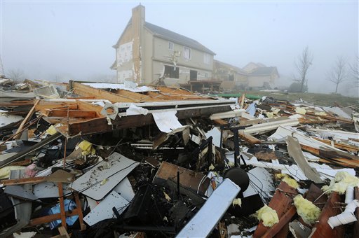 
 Extensive tornado damage in Dexter, Mich. is seen Friday, March 16, 2012. Initial estimates indicate the tornado that hit Dexter, northwest of Ann Arbor, Thursday evening was packing winds of around 135 mph, National Weather Service meteorologist Steven Freitag said Friday. (AP Photo/Detroit News, Daniel Mears)
 