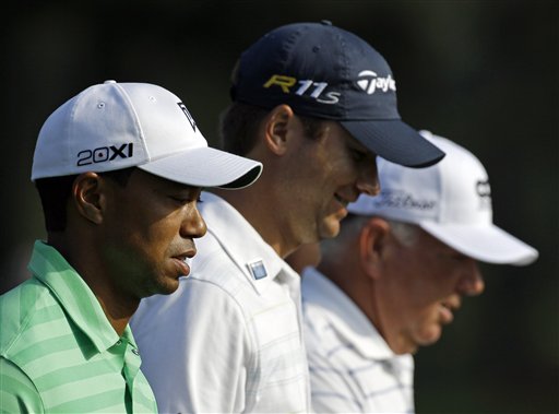 
 Tiger Woods, Sean O'Hair and Mark O'Meara walk down the 14th hole during a practice round for the Masters golf tournament Wednesday, April 4, 2012, in Augusta, Ga. (AP Photo/Matt Slocum)
 