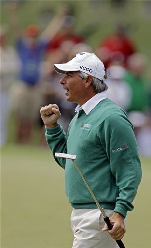 
 Lee Westwood, of England, takes his second shot on the seventh hole during the second round the Masters golf tournament Friday, April 6, 2012, in Augusta, Ga. (AP Photo/David J. Phillip)
 